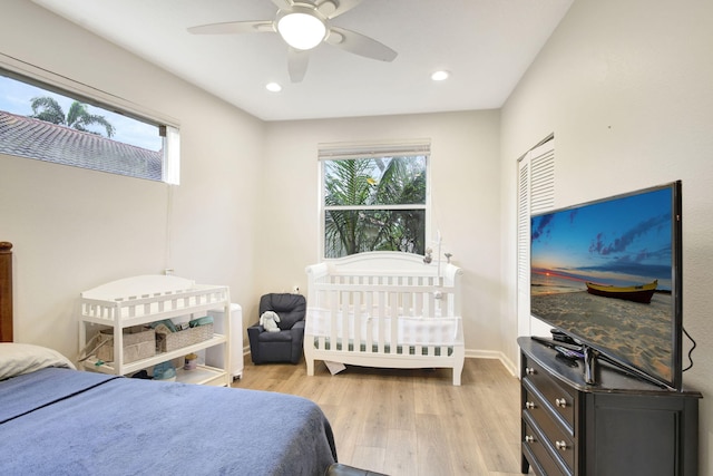 bedroom featuring ceiling fan and light wood-type flooring