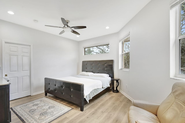 bedroom featuring ceiling fan and light wood-type flooring