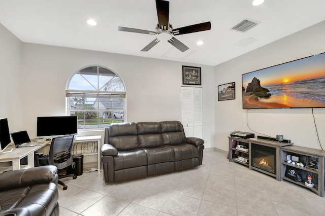 living room featuring ceiling fan