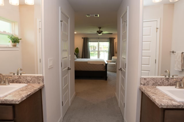 bathroom with vanity and ceiling fan