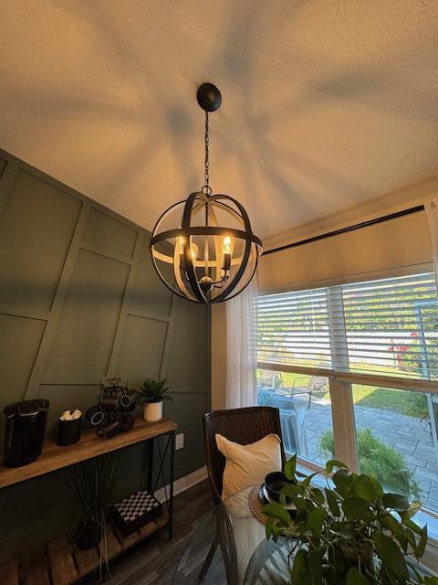 dining space featuring an inviting chandelier