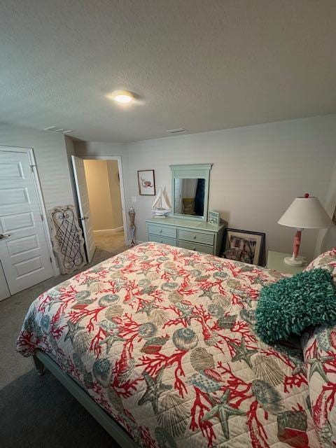 bedroom featuring a textured ceiling