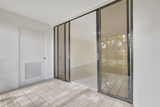 interior space with light tile patterned floors