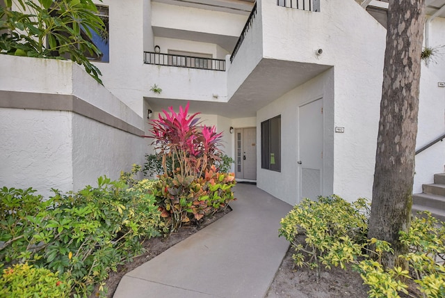 doorway to property featuring a balcony