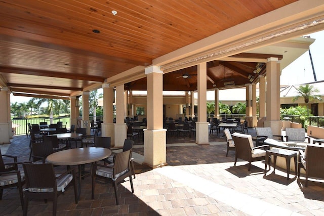 view of patio with a gazebo and ceiling fan