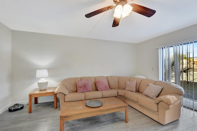 living room featuring ceiling fan