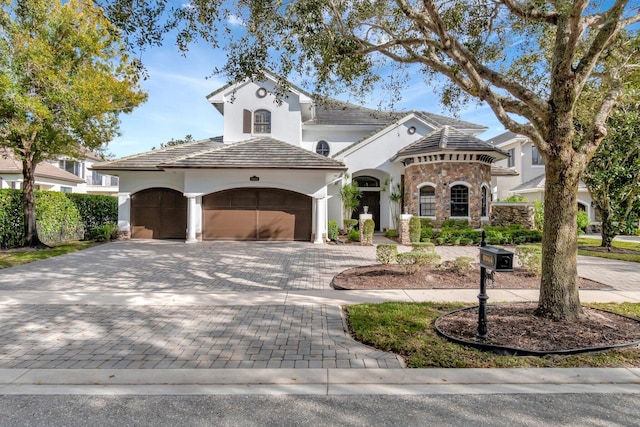 view of front of home with a garage