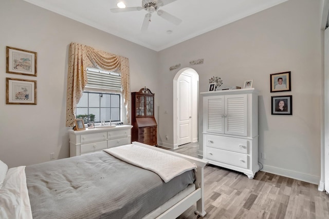 bedroom featuring ceiling fan and light hardwood / wood-style flooring