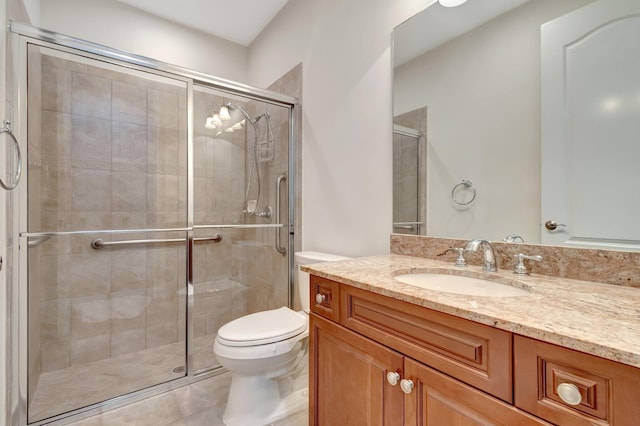 bathroom with walk in shower, tile patterned flooring, vanity, and toilet