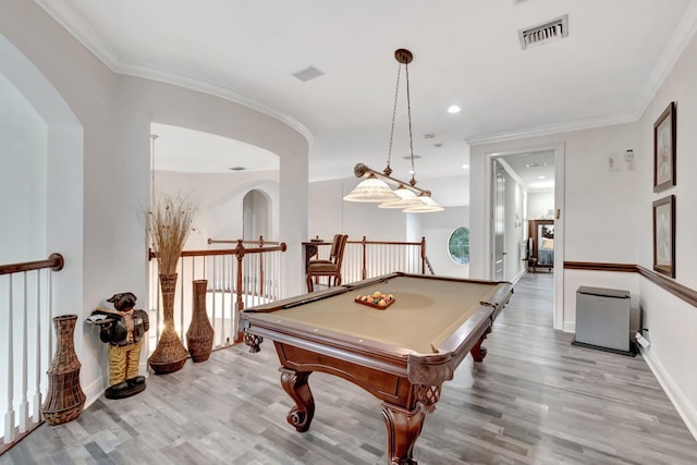 recreation room with ornamental molding, light wood-type flooring, and billiards