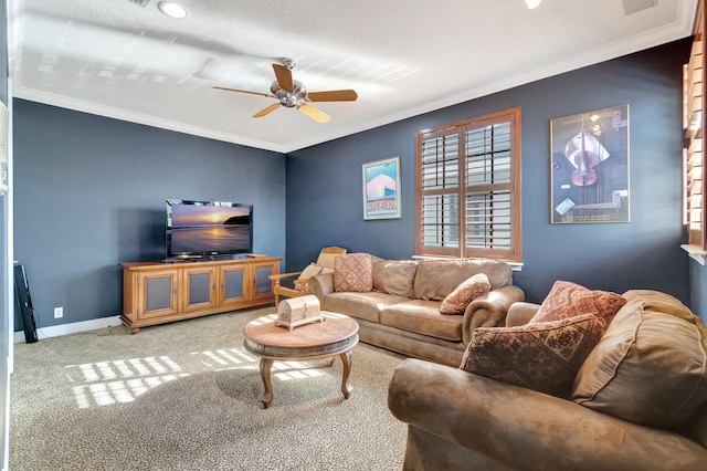 living room featuring ceiling fan, carpet floors, and ornamental molding