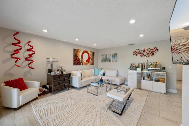 dining space with a textured ceiling