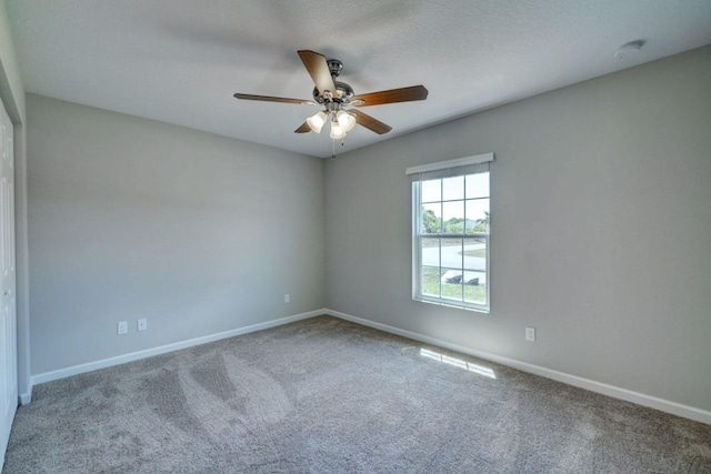 unfurnished room featuring carpet floors