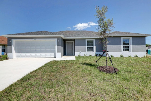 ranch-style house with a garage and a front yard