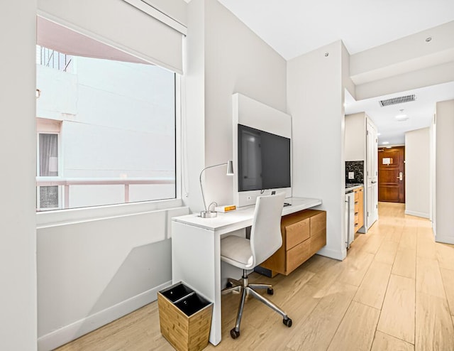 office area featuring light hardwood / wood-style floors