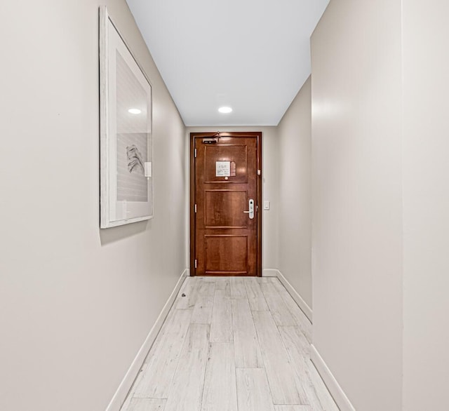 doorway to outside featuring light hardwood / wood-style floors