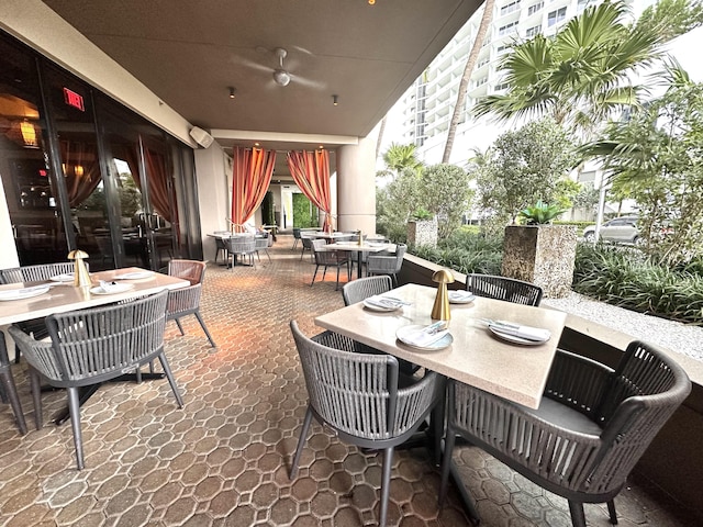 view of patio / terrace featuring ceiling fan