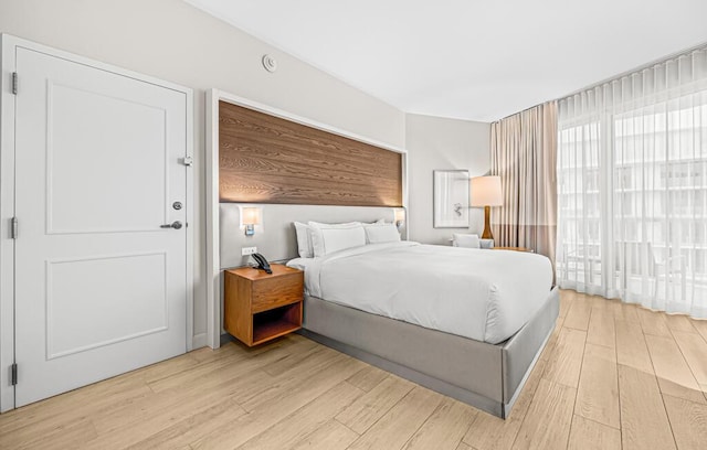 bedroom featuring light wood-type flooring