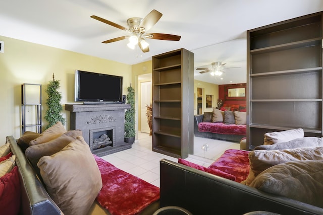 tiled living room featuring ceiling fan