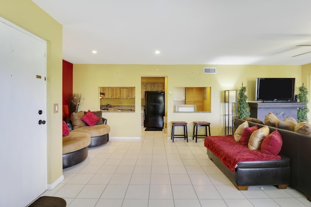 living room featuring light tile patterned floors