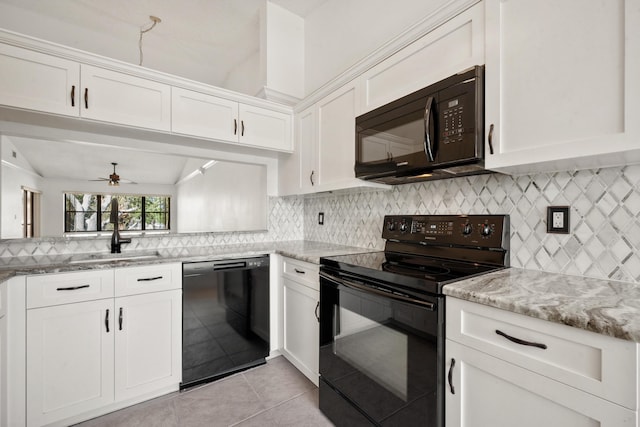 kitchen with white cabinetry, sink, ceiling fan, light tile patterned floors, and black appliances