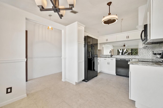 kitchen with ceiling fan, light stone counters, decorative light fixtures, white cabinets, and black appliances