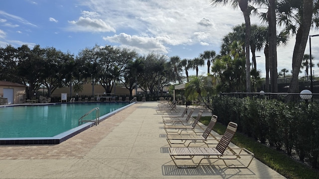 view of pool featuring a patio area