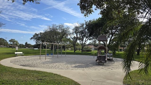 view of jungle gym with a lawn