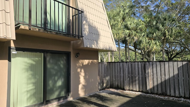 view of home's exterior featuring a balcony