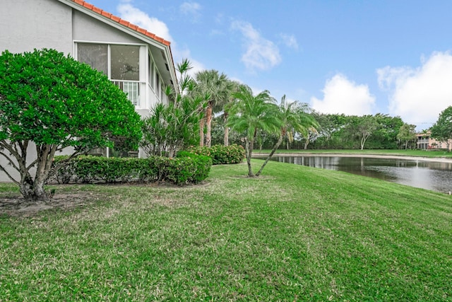 view of yard with a water view