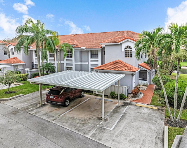 exterior space featuring a carport