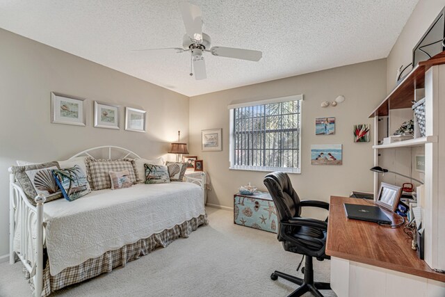 tiled living room featuring a textured ceiling and ceiling fan