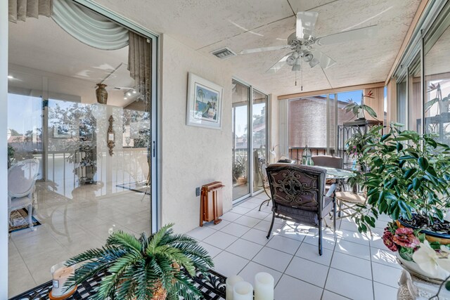 9817 Seacrest Cir Unit 201, Boynton Beach, FL 33437 - bathroom featuring toilet, a shower with curtain, vanity, tile patterned flooring, and wallpapered walls