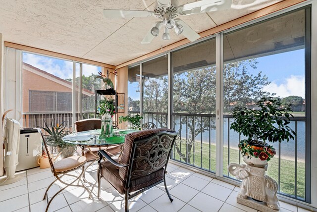 9817 Seacrest Cir Unit 201, Boynton Beach, FL 33437 - bedroom with multiple windows, a textured ceiling, wood finished floors, and a ceiling fan