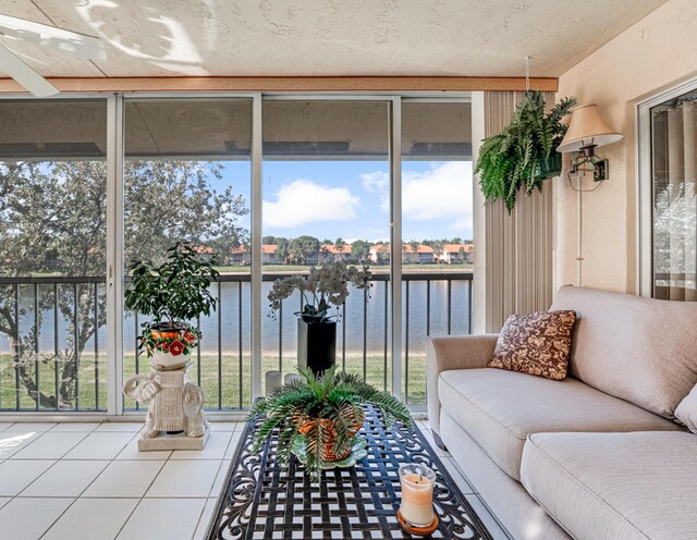 9817 Seacrest Cir Unit 201, Boynton Beach, FL 33437 - bedroom featuring ceiling fan, a textured ceiling, access to outside, and wood finished floors