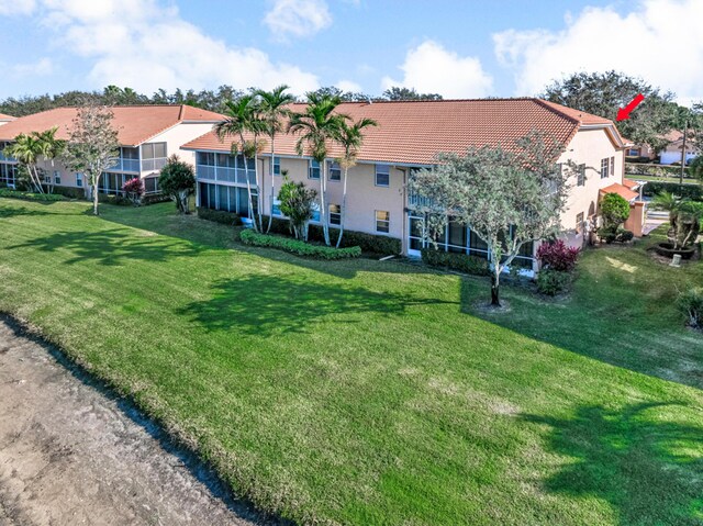 9817 Seacrest Cir Unit 201, Boynton Beach, FL 33437 - sunroom with a wealth of natural light and a water view