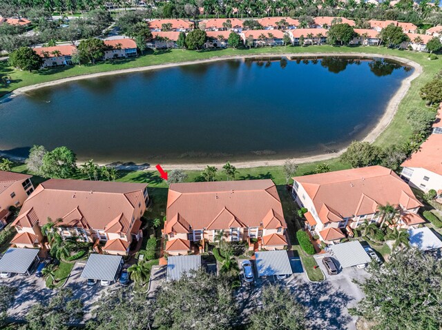 9817 Seacrest Cir Unit 201, Boynton Beach, FL 33437 - view of home's community with a yard, a water view, and a residential view