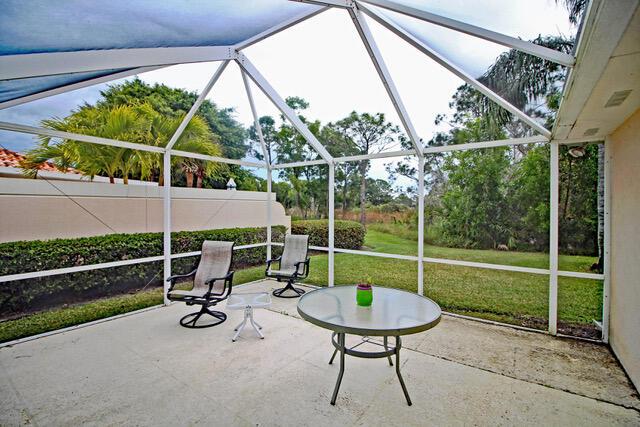 view of patio with a lanai