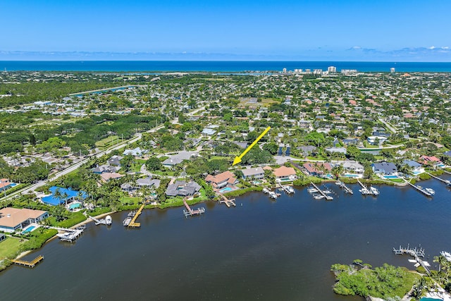 bird's eye view featuring a residential view and a water view