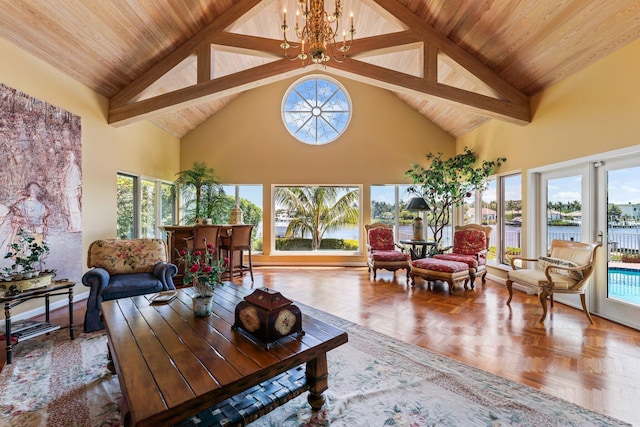 sunroom / solarium with an inviting chandelier, a healthy amount of sunlight, wooden ceiling, and vaulted ceiling