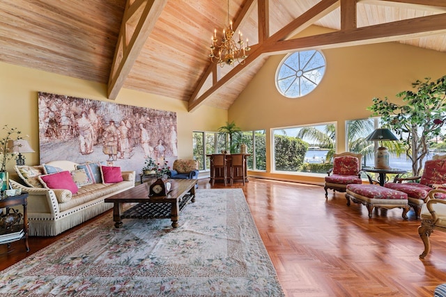 living area featuring beamed ceiling, high vaulted ceiling, and a chandelier