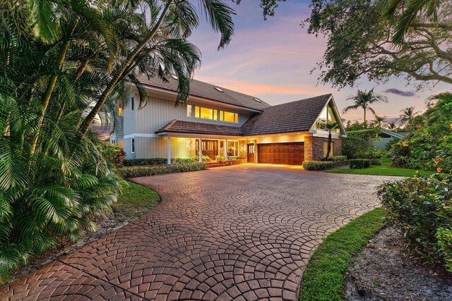 view of front of property with a garage