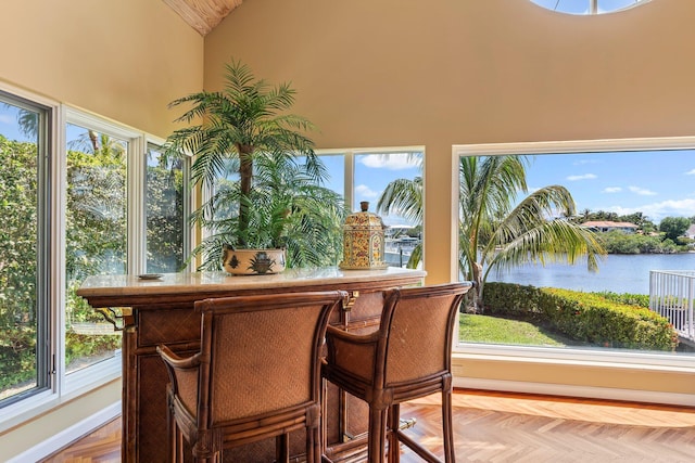 sunroom with a water view