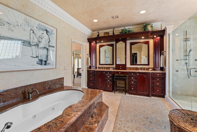 bathroom with visible vents, double vanity, ornamental molding, a stall shower, and a sink