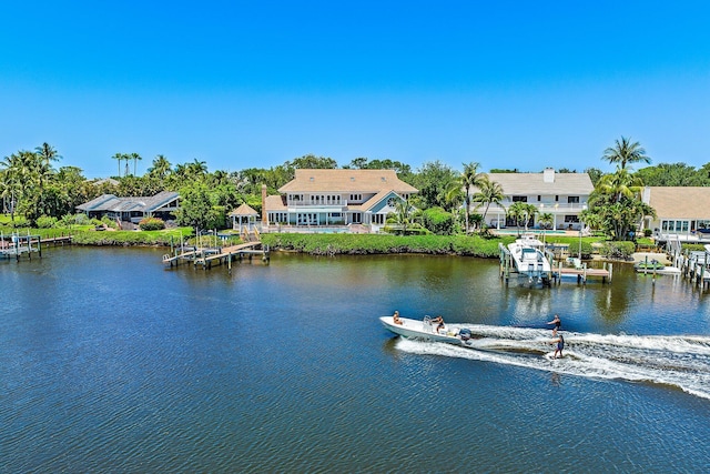 property view of water with a dock