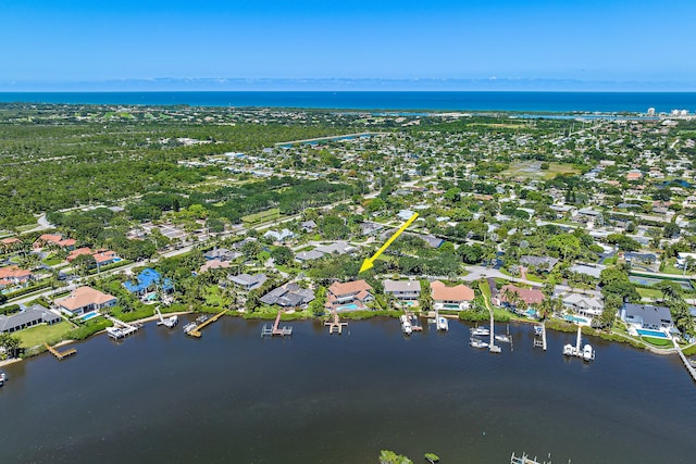 aerial view with a residential view and a water view