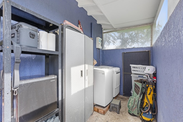 washroom featuring washing machine and dryer