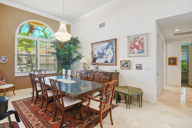 dining room with ornamental molding