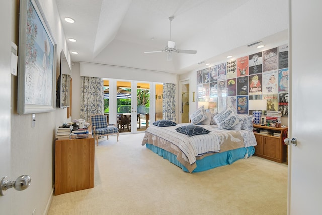 bedroom with ceiling fan, access to outside, a raised ceiling, light carpet, and french doors