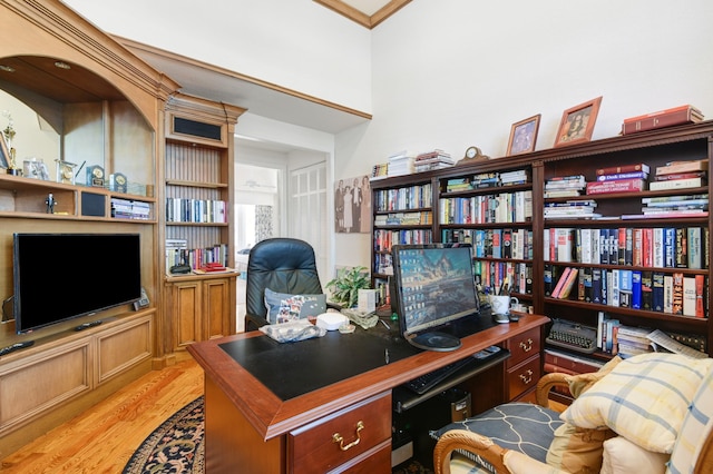 office with light hardwood / wood-style floors